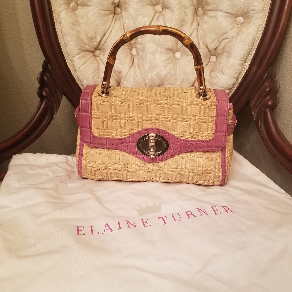 Structured bamboo handled handbag
